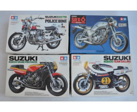 Four unbuilt 1/12 scale plastic model motorcycle kits from Tamiya to include 14009 Suzuki RGB500 Team Gallina, 1448 Yamaha SR