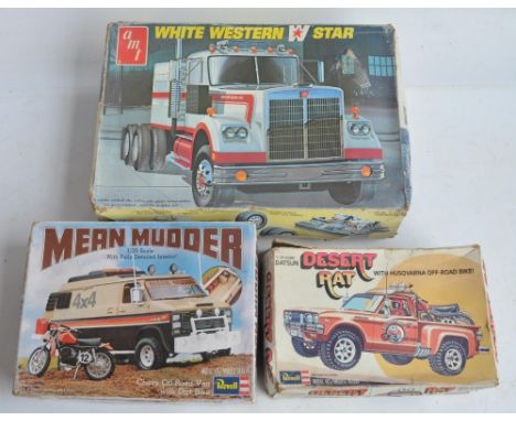 Three unbuilt 1/25 scale plastic model vehicles to include rare and long since discontinued late 70's Revell Mean Mudder Chev