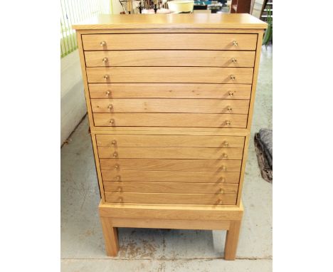 Hand made display cabinet. Made from light oak this is an exceptionally well made piece of furniture designed to house a very