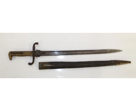 German imperial bayonet 1871 pattern with brass grip and steel cross guard. Complete with original brass-mounted leather scab