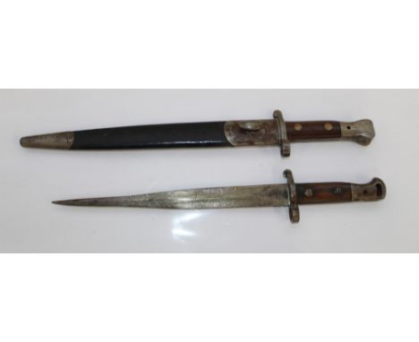 Lee Metford 1888 pattern bayonet, complete with original leather scabbard, with VR crowned-cypher to blade. Cut down bayonet 