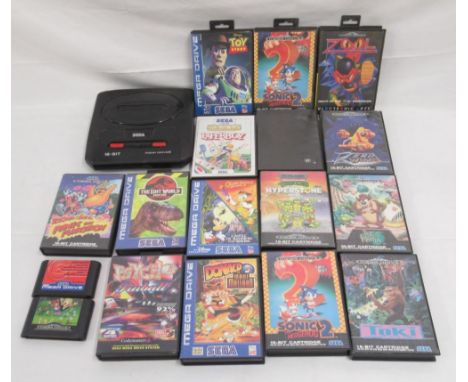 Sega Mega Drive II 16-bit console(lacking adapter or controller) 15 boxed games(4 lacking manuals) and 2 loose games 