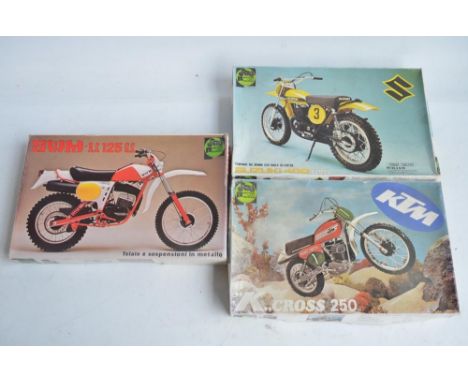 Three unbuilt 1/9 scale moto cross motorbike plastic model kits from Protar to include KTM "K" Cross 250 (parts loose in box,