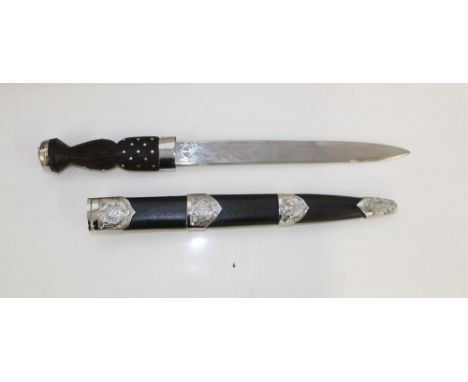 Reproduction C19th Scottish Dirk. With crown to pommel and floral etching to blade. Complete with original leather scabbard 