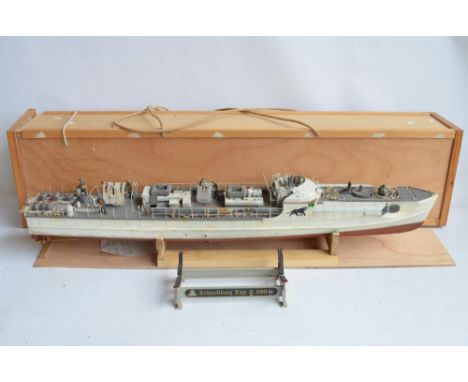 Radio controlled 1/35 scale German Navy Schnellboot model as converted from the plastic kit by Italeri with wooden transport 