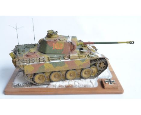 Competently built 1/16 scale Trumpeter WWII German Army Panther plastic tank model with detailed crew interior on snowy diora