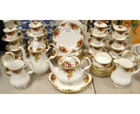 A Royal Albert Old Country Roses tea and coffee service, including tea pot, coffee pot, bread and butter plates, etc.