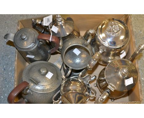 Metalware - a four piece EPNS tea and coffee service; another, planished pewter