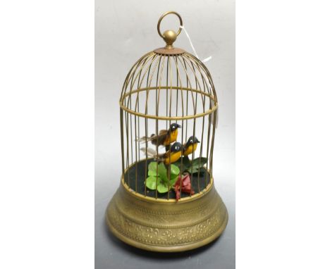 A clock work singing bird cage automaton, three birds amongst flowers, 31cm high