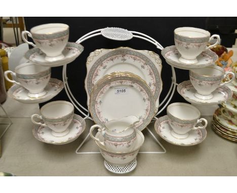 A Royal Tuscan tea service for six decorated with swags and bluebirds.