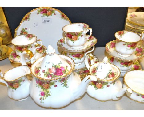 A Royal Albert Old Country Rose pattern six setting tea service inc, large Teapot, small teapot,  milk, sugar, cups, sauces, 