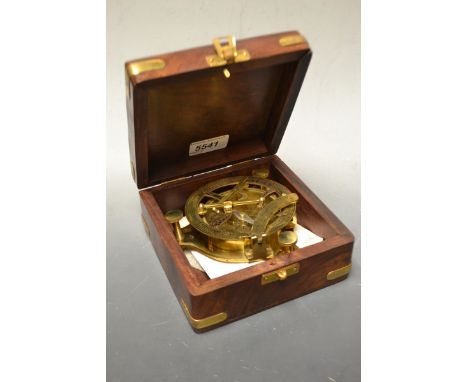 A reproduction brass sundial compass, mahogany case
