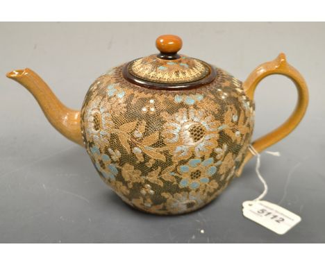 A Doulton Lambeth Slater's patent salt glazed stoneware Chine ware ovoid teapot and cover, in shades of brown and blue, decor