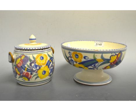 A Carter Stabler Adams Poole pottery biscuit barrel and cover, decorated with flowers;  a similar footed bowl (2)