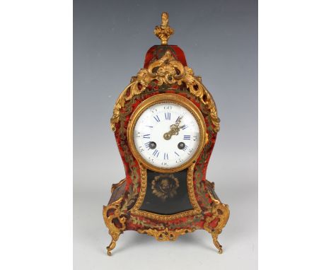 A late 19th century French gilt metal mounted boulle and red tortoiseshell mantel clock with eight day movement striking on a