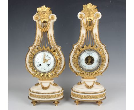 A late 19th century French ormolu mounted white marble Marie Antoinette style mantel clock and matching aneroid barometer, th