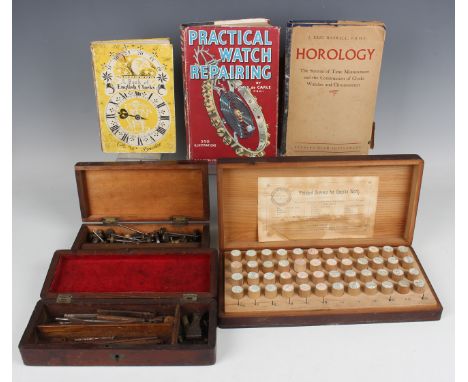 A collection of watchmaker's tools and accessories, including a depthing tool, a staking set, boxed, a cased set of assorted 