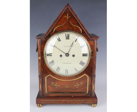 A Regency rosewood bracket clock with eight day twin fusee movement striking hours on a bell, the 8-inch circular painted dia