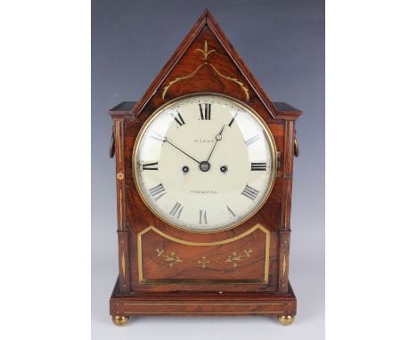 A Regency rosewood bracket clock with eight day twin fusee movement striking hours on a bell, the 8-inch circular painted dia