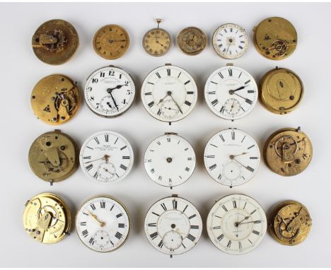 A large collection of pocket watch movements and dials, including a fusee movement with verge escapement, detailed 'L. Freema