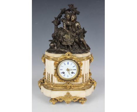 A late 19th century French brown patinated bronze, ormolu and white marble mantel clock, the eight day movement with silk sus