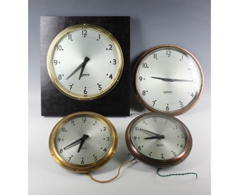 Two Gents of Leicester brass cased circular electric slave wall clocks, each 7½-inch signed silvered dial with black Arabic h