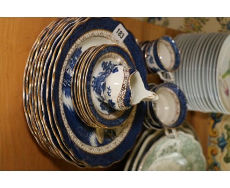 Group of Booth's Real Old Willow pattern dishes and ware comprising nine plates, six saucers, three large and three small cup
