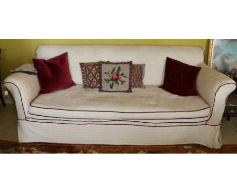 Victorian mahogany cream upholstered sofa with turned legs and brass castors CONDITION REPORT: The seat measures 72cm x 190cm