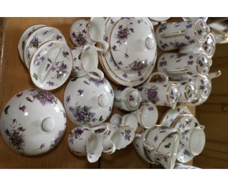 Hammersley & Co bone china tea set of violet pattern retailed by T. Goode & Co Ltd., comprising two teapots, two coffee pots,