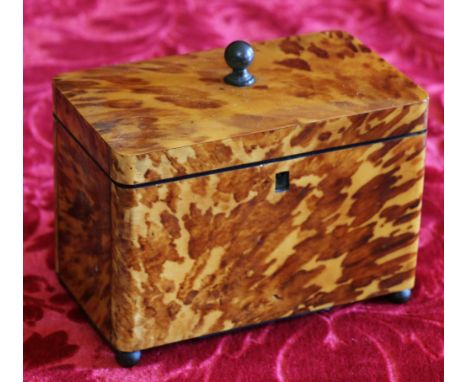 Regency blonde tortoishell tea caddy raised on ball supports, 14cm x 17,5cm CONDITION REPORT: In reasonablly good order
Minor