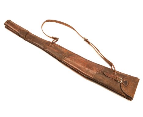 A VINTAGE LEATHER FLEECE-LINED DOUBLE GUNSLIP, with leather shoulder strap, measuring approx. 46in..  