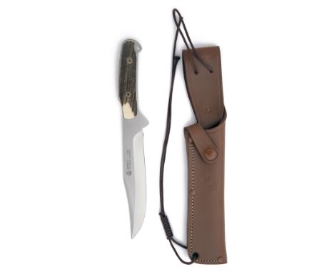 PUMA, SOLINGEN TWO SHEATH-KNIVES, including a boxed model 'WILDTOTER', serial no. 41582, with 5 3/4in. clip-point blade and n