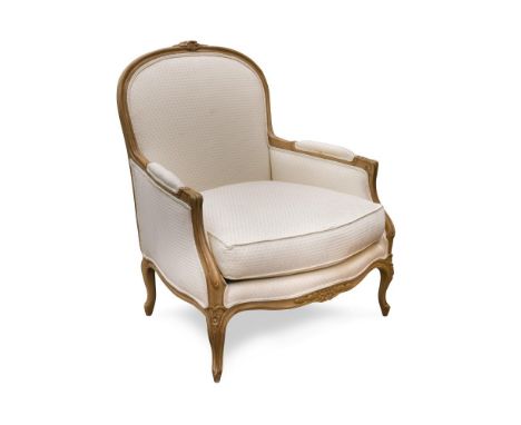 A French style fauteuil, with foliate carved show wood, deep loose cushion seat, on swept legs 104 x 87 x 809cm (41 x 34 x 31