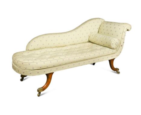 A Regency chaise Longue, circa 1815, with scroll end, upholstered in a striped and floral printed fabric, with buttoned seat 