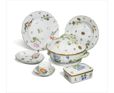 A Herend porcelain dinner service decorated with Autumn fruit, comprising twelve dinner plates, side plates, dessert plates a