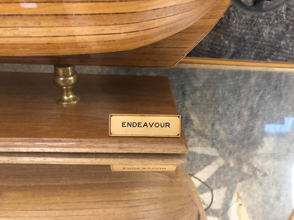 Endeavour' a wooden model ship, within a bespoke glazed display case