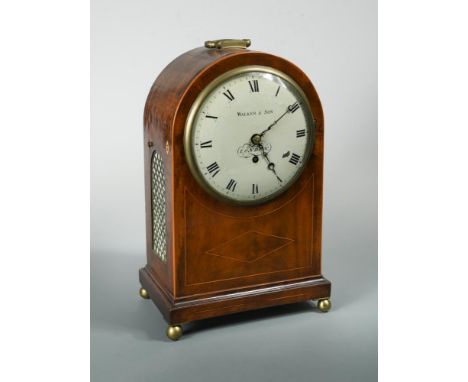 A 19th century mahogany domed top bracket timepiece by Walker &amp; Son, London, folding handle above the painted dial, brass