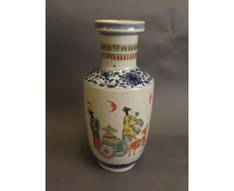 A fine Chinese blue and white porcelain vase with scrolling foliate banding and painted enamel decoration of travellers and a