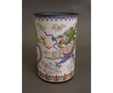 A Cantonese enamel brushpot decorated with lotus flowers, phoenix, dragon and flaming pearls, 4 character mark, 5'' high, 3¼'