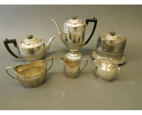 A six piece silver plated tea set by Benetfink & Co. comprising a biscuit barrel, tea caddy etc, largest 9¾'' high