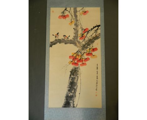 A large Chinese watercolour scroll depicting birds perched on a fruiting peach tree, 26½'' x 51½''