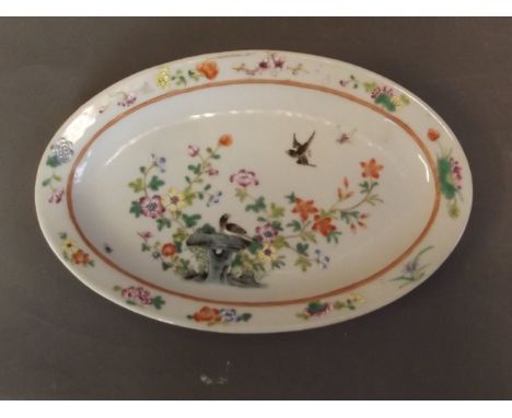 A late C19th/early C20th Chinese porcelain oval dish with painted enamel decoration of birds in a birdbath with flowers, 6 ch