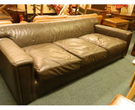 A large contemporary sofa in dark brown leather, 95'' long