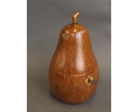 A fruitwood tea caddy in the form of a pear, 7½'' high