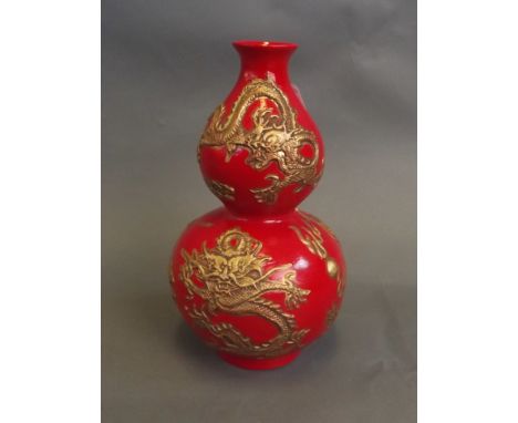 A Chinese red ground double gourd pottery vase with gilt relief dragon and flaming pearl decoration, impressed mark, 6¾'' hig