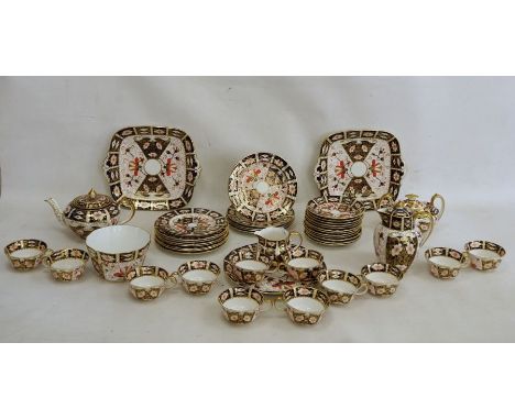 Royal Crown Derby Imari pattern teaset, no.2451, viz:- 12 cups and saucers, 12 tea plates plus 2 smaller tea plates, slop bow