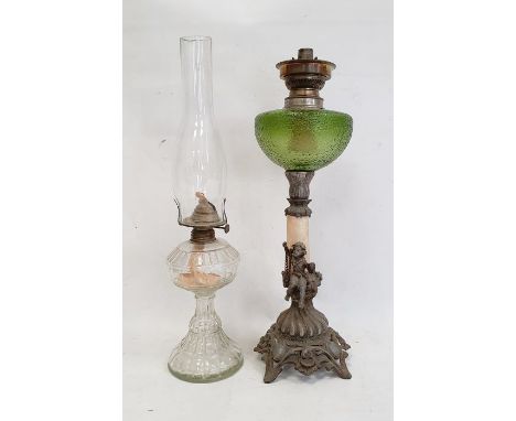 Metal and green glass oil lamp (no shade) and a moulded glass oil lamp with funnel (no shade) (2) 
