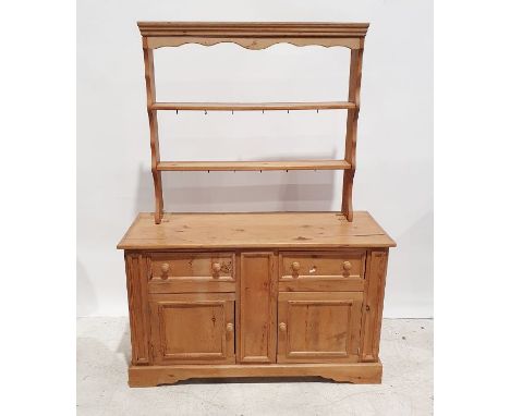 20th century pine sideboard, the rectangular top above two drawers, two cupboard doors, on bracket feet and associated pine r