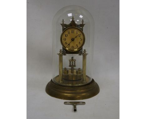 German dome-cased brass mantel clock with Arabic numerals to the dial
