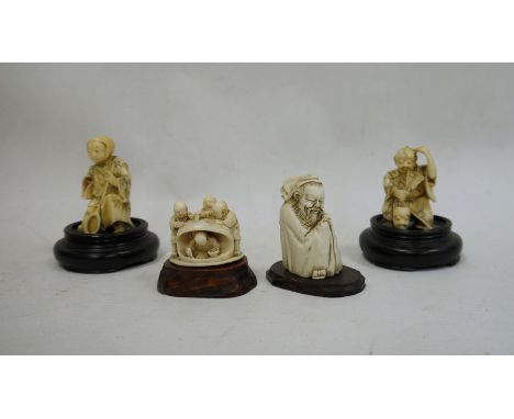 Japanese carved ivory okimono of a crouching figure, a Japanese carved ivory okimono of a player with mask and fan, a Japanes